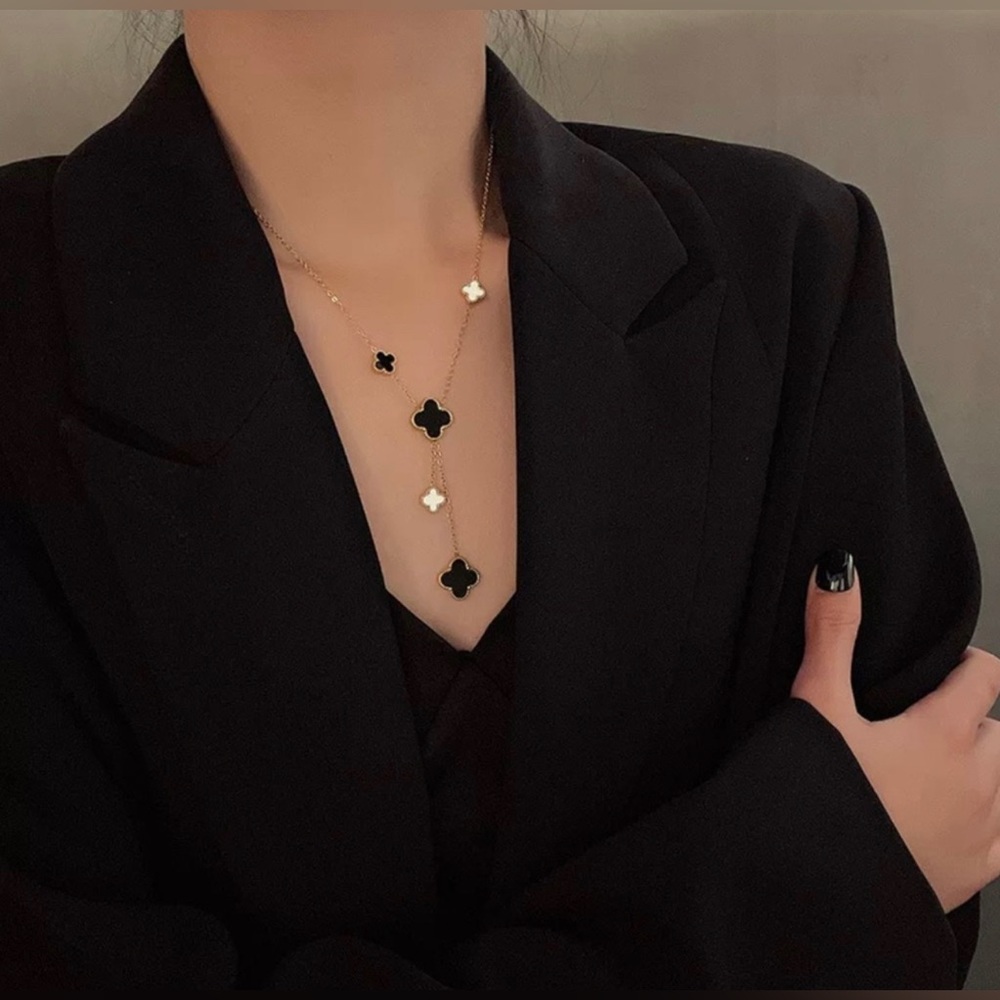 New 18k Rose Gold long 4 leaf clover stainless steel necklace.